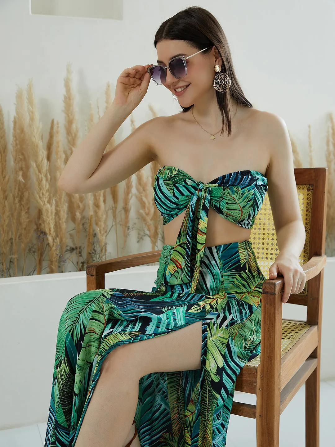 Berrylush Women Green & Black Floral Printed Strapless Neck Thigh-High Slit Crop Top & Maxi Skirt Co-Ordinate Set