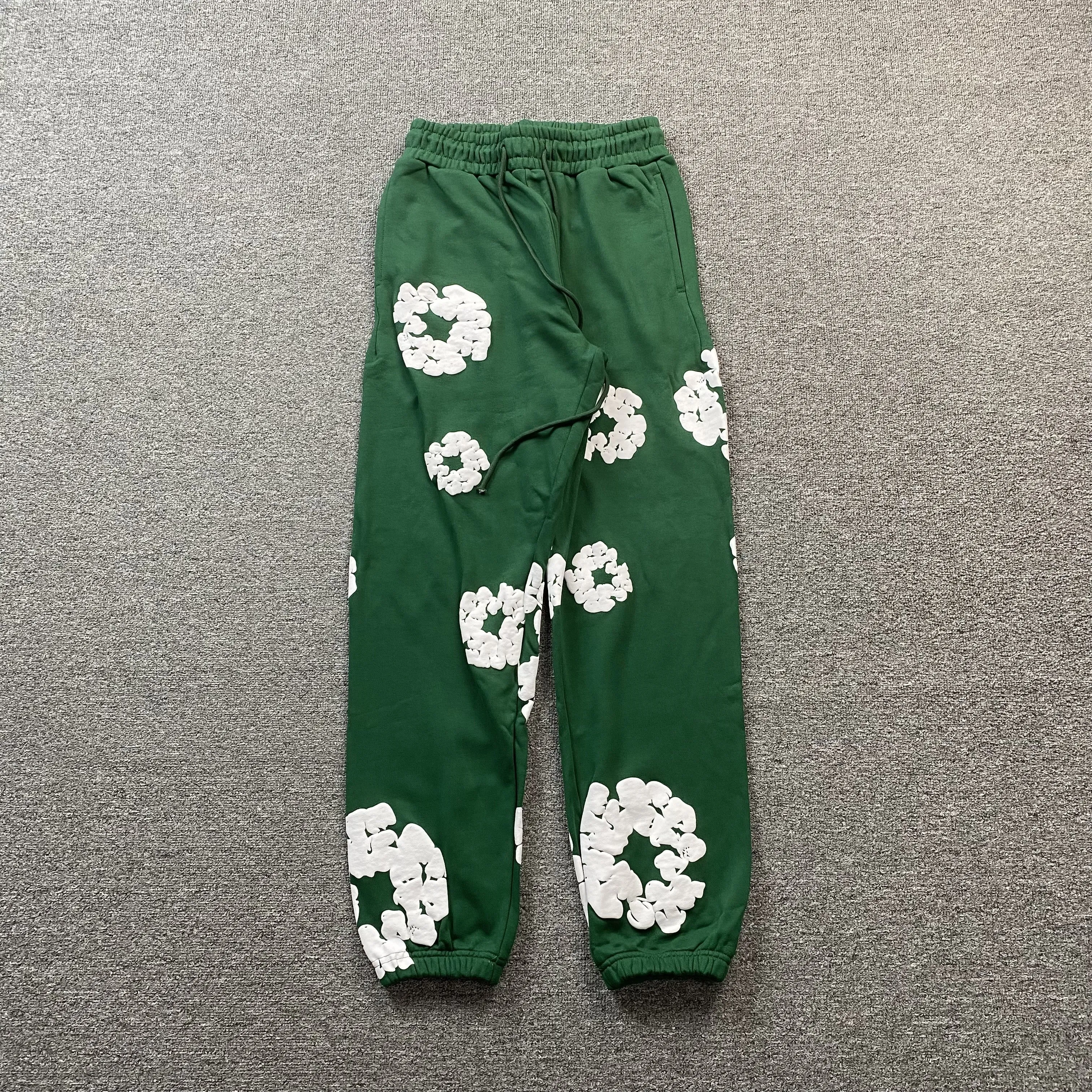 DENIM TEARS COTTON WREATH SWEATPANTS GREEN