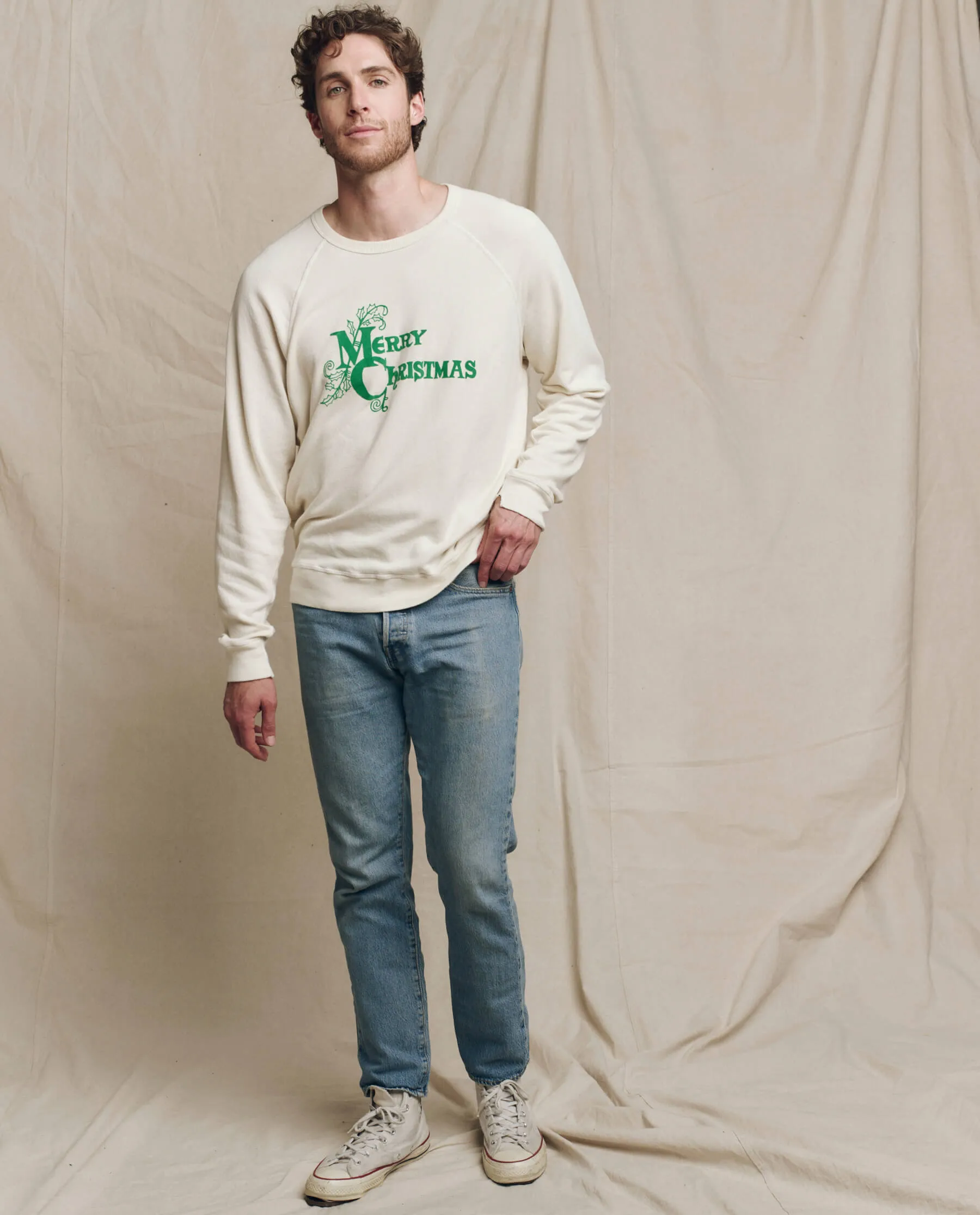 The Men’s College Sweatshirt. Graphic -- Washed White with Merry Christmas Graphic